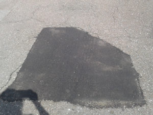 After Pothole ROOSEVELT SHOPING CENTER
